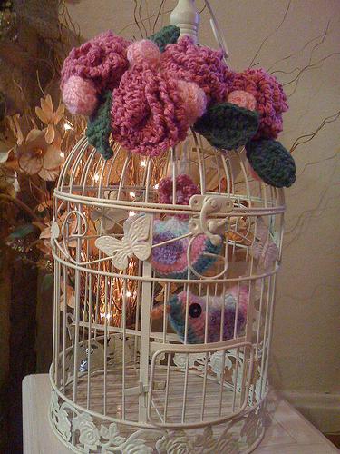 Cage for a bird decorative as an element of an interior